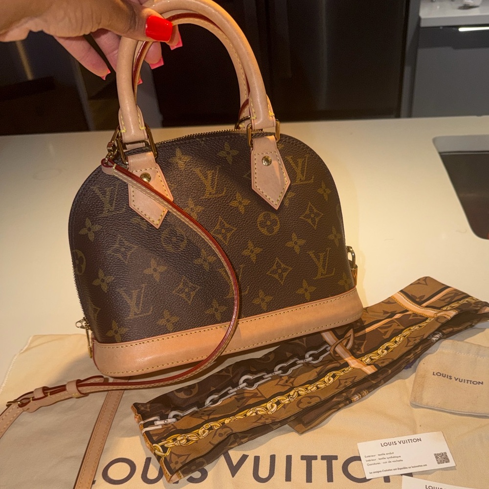 Louis Vuitton Alma BB in excellent condition w/ tags & receipt included!!